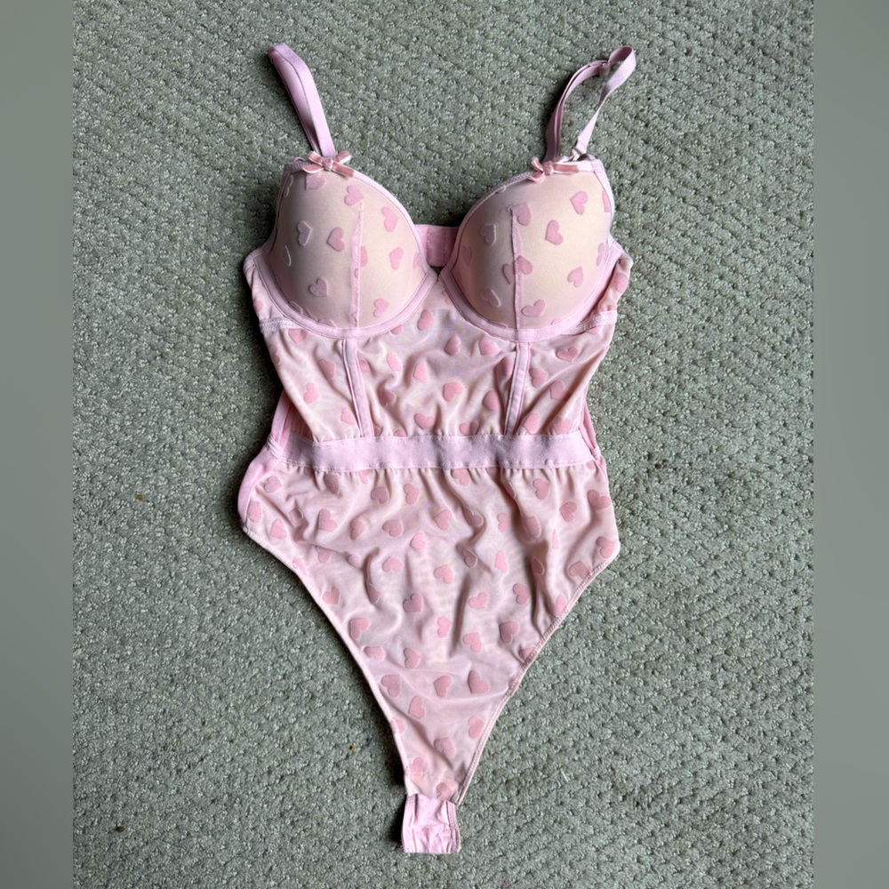 Adorable pink bodysuit with hearts